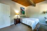 This cozy bedroom features a comfortable bed, perfect for a relaxing retreat.