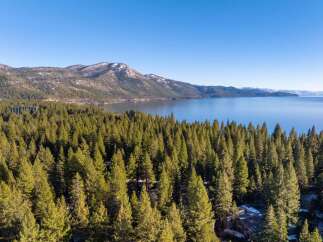 Discover the tranquility of lakeside living with this stunning property.
