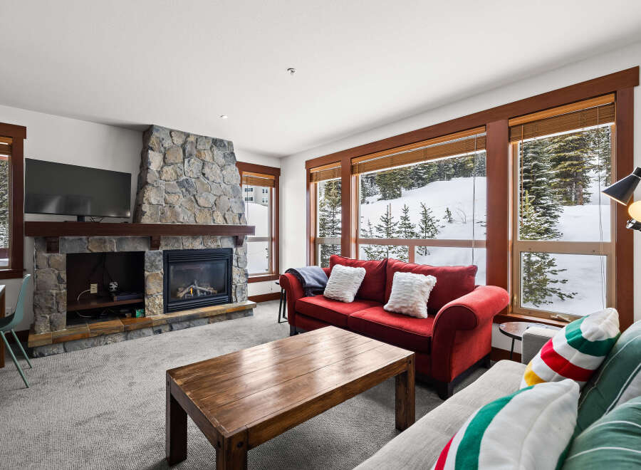 Experience the ultimate in cozy mountain living with this stunning property.
