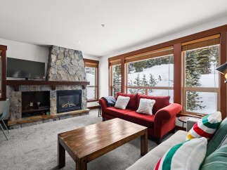 Experience the ultimate in cozy mountain living with this stunning property.
