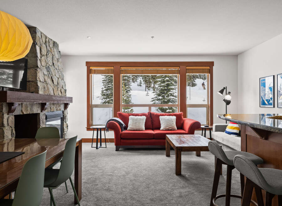 This stunning living space features a cozy fireplace, perfect for chilly evenings.