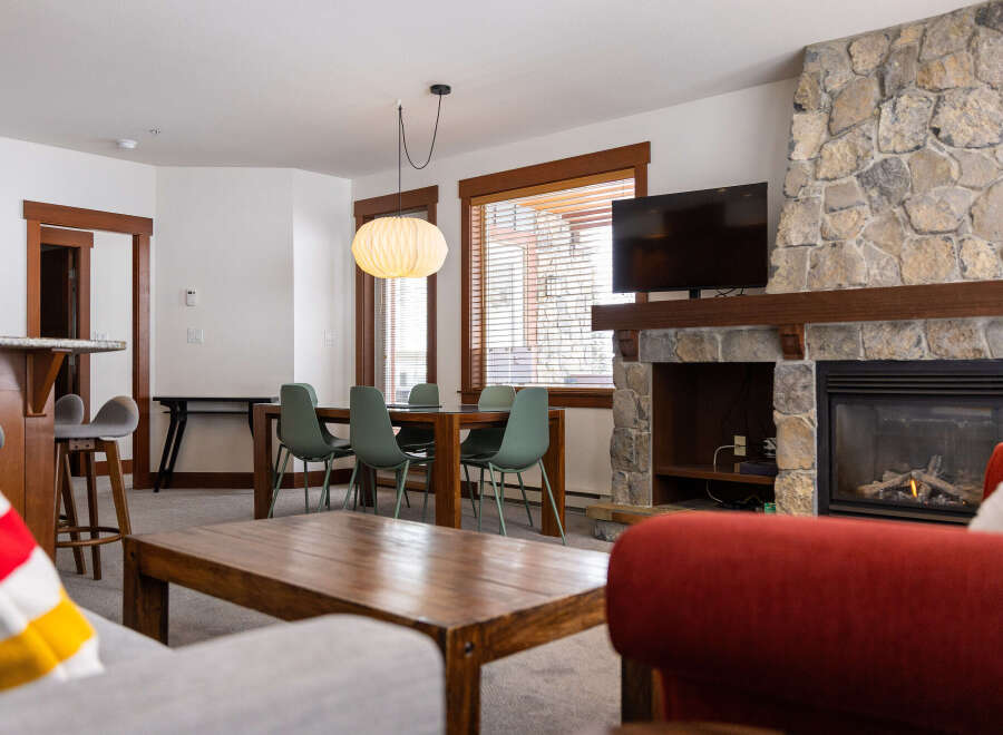 This stunning property boasts a cozy living space, perfect for relaxation and entertaining.