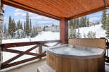 Enjoy breathtaking mountain views from this luxurious hot tub.