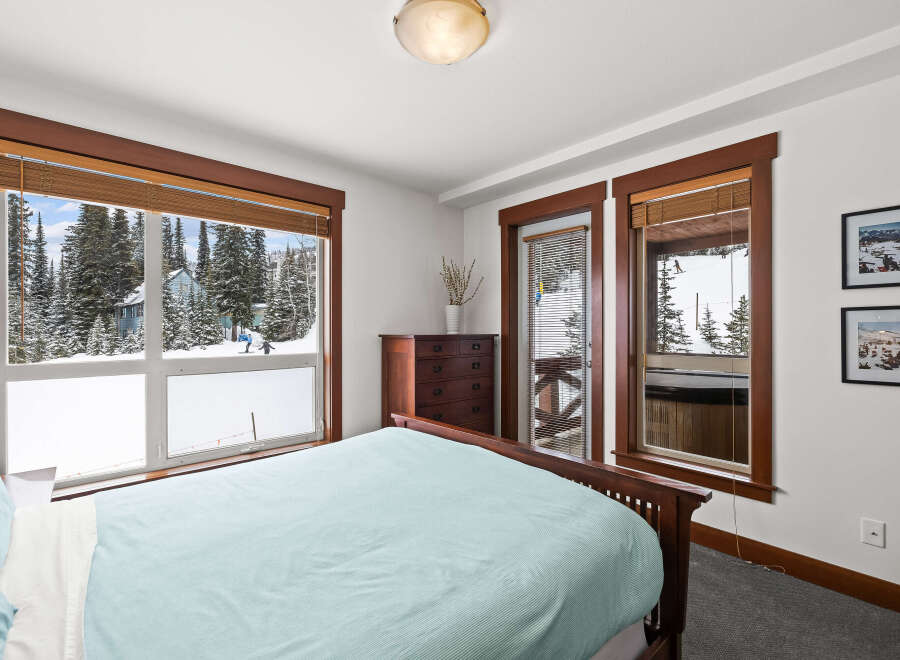 Experience the ultimate in mountain living with this stunning bedroom.