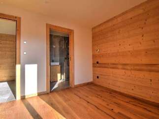 Step into this beautifully designed space, featuring stunning wooden accents and a warm, inviting atmosphere.