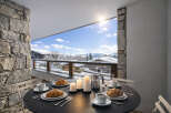 Enjoy a cozy breakfast with a stunning view in this charming property.