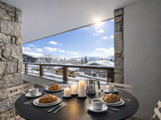 Enjoy a cozy breakfast with a stunning view in this charming property.