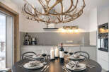 Experience luxury living in this stunning property, featuring a beautifully designed dining area.