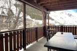 Enjoy breathtaking mountain views from this charming balcony.