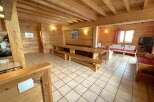 Step into this charming chalet, boasting a warm and inviting interior.
