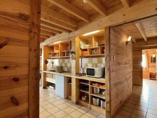 Step into this charming kitchen, a perfect blend of rustic charm and modern convenience.