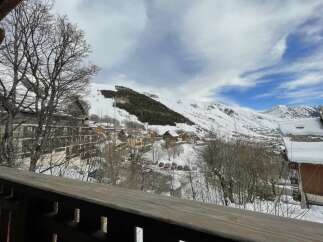 Enjoy breathtaking mountain views from this charming property.