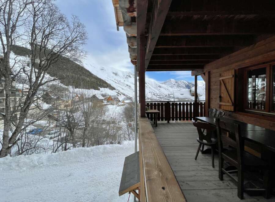 Enjoy breathtaking mountain views from this charming chalet.