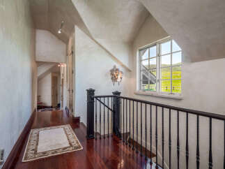 This stunning hallway showcases exquisite architectural details and luxurious finishes.