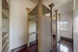 Step into luxury with this stunning walk-in closet, designed for both style and functionality.