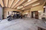 Explore this spacious garage, perfect for storing vehicles and equipment.