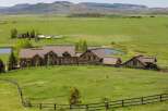 Nestled amidst rolling green hills and picturesque ponds, this expansive estate offers a serene countryside retreat.