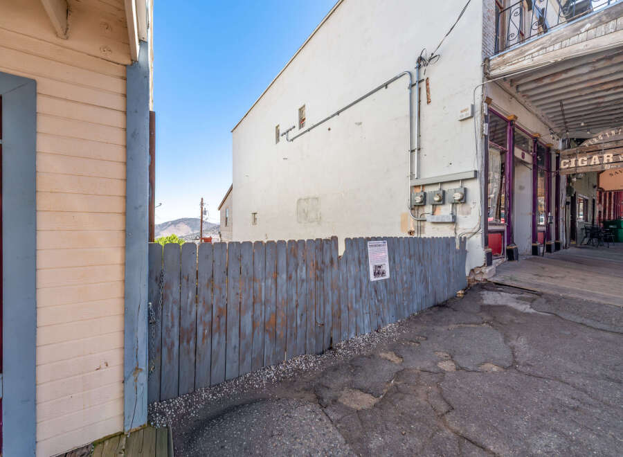 Explore the historic charm of this property, featuring a classic facade and a welcoming entrance.