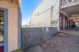 Explore the historic charm of this property, featuring a classic facade and a welcoming entrance.