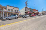 Explore the charm of this historic streetscape, perfect for a unique commercial venture.