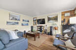 Step into this inviting living room, perfect for relaxation and entertainment.