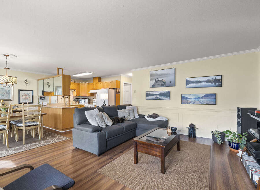 Step into this inviting living space, perfect for relaxation and entertaining.