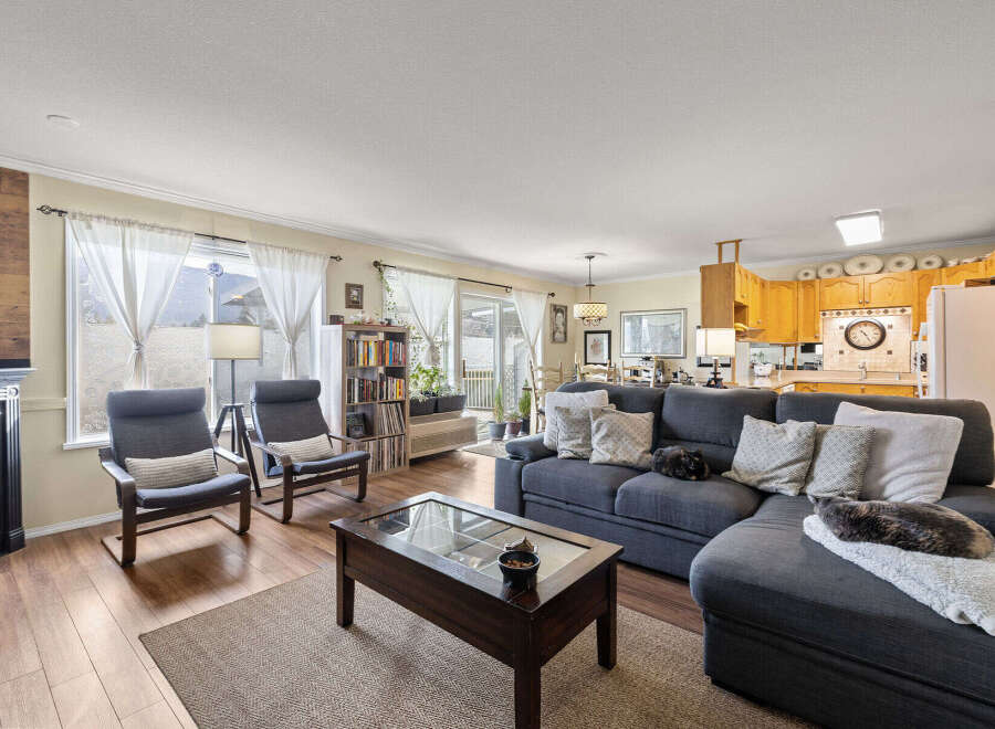 Step into this inviting living space, perfect for relaxation and entertaining.