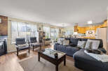 Step into this inviting living space, perfect for relaxation and entertaining.