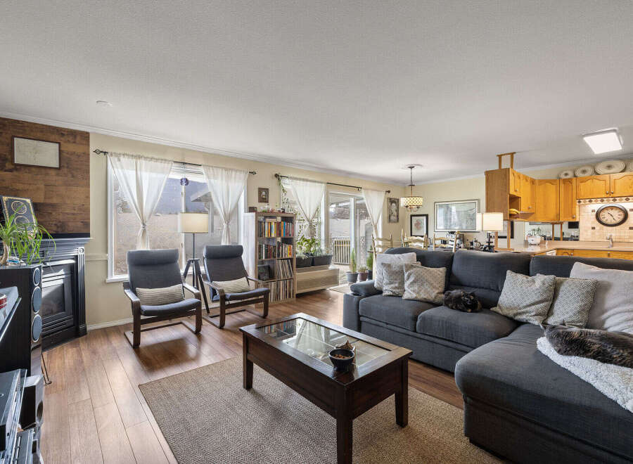 Step into this inviting living space, perfect for relaxation and entertaining.