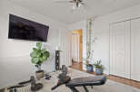This home gym offers a versatile space for fitness enthusiasts.