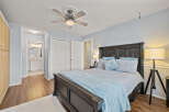 Step into this inviting bedroom, featuring a comfortable bed and ample natural light.
