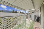 Enjoy the fresh air and stunning views from this charming outdoor space.