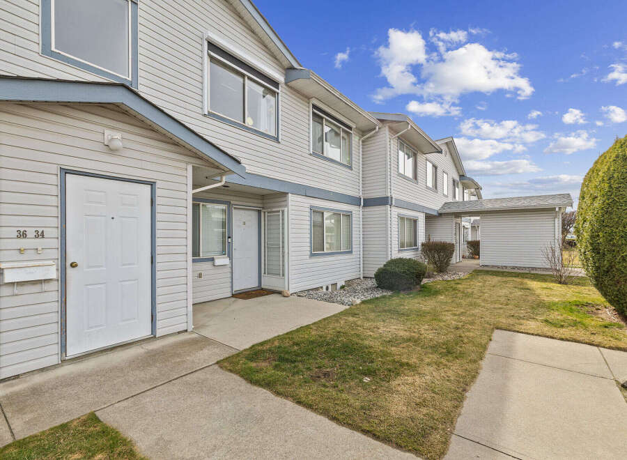 Discover this charming townhome featuring a well-maintained exterior and inviting curb appeal.