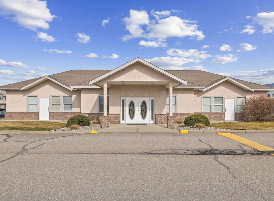 This stunning property boasts a beautiful facade with a welcoming entrance.