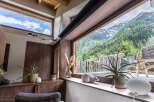 Experience breathtaking mountain views from this stunning property.