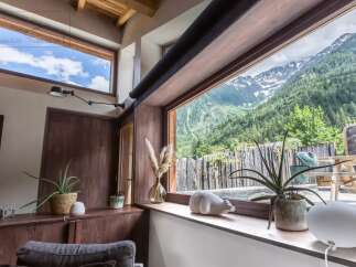 Experience breathtaking mountain views from this stunning property.