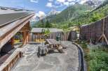 Escape to the mountains in this stunning property, featuring a beautiful outdoor patio perfect for enjoying the breathtaking views.