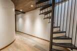 Discover the elegance of this stunning property featuring a unique spiral staircase.
