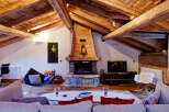 Experience rustic elegance in this stunning chalet-style living room.