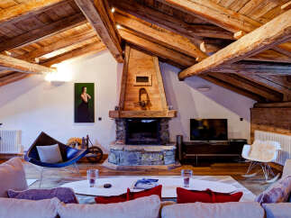 Experience rustic elegance in this stunning chalet-style living room.