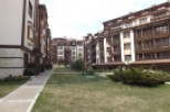 Discover luxurious apartments nestled in a scenic resort setting.