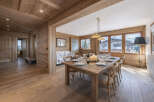 This stunning property boasts a warm and inviting dining area, perfect for hosting gatherings.