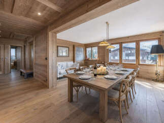 This stunning property boasts a warm and inviting dining area, perfect for hosting gatherings.