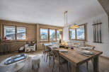 This stunning property boasts a spacious dining area, perfect for hosting gatherings.
