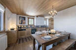 Experience rustic charm in this inviting kitchen and dining area.
