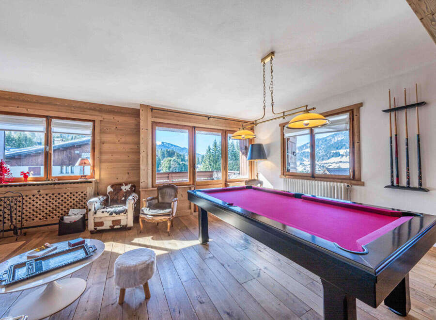 This stunning property boasts a luxurious game room, perfect for entertaining guests or enjoying a relaxing evening.