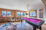 This stunning property boasts a luxurious game room, perfect for entertaining guests or enjoying a relaxing evening.