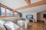 Discover the charm of this cozy living space, perfect for a mountain retreat.