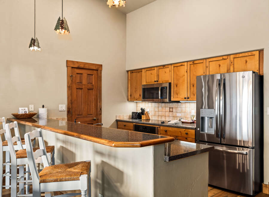 This stunning kitchen boasts a modern design with a touch of rustic charm.