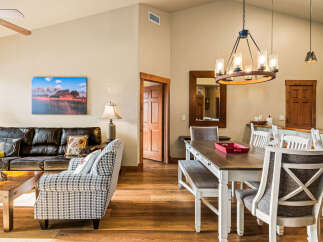 Step into this inviting living space, showcasing a harmonious blend of comfort and style.